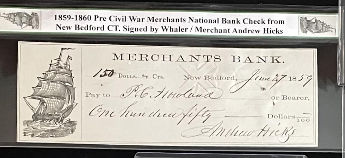 A check is shown with the words " merchants bank ".